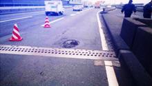 Example of damage to pavement caused by fatigue of steel plate deck